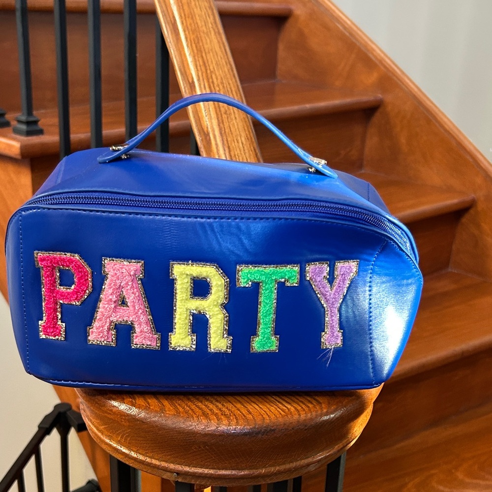 Vibrant Blue Cosmetic Bag with Multicolor Lettering